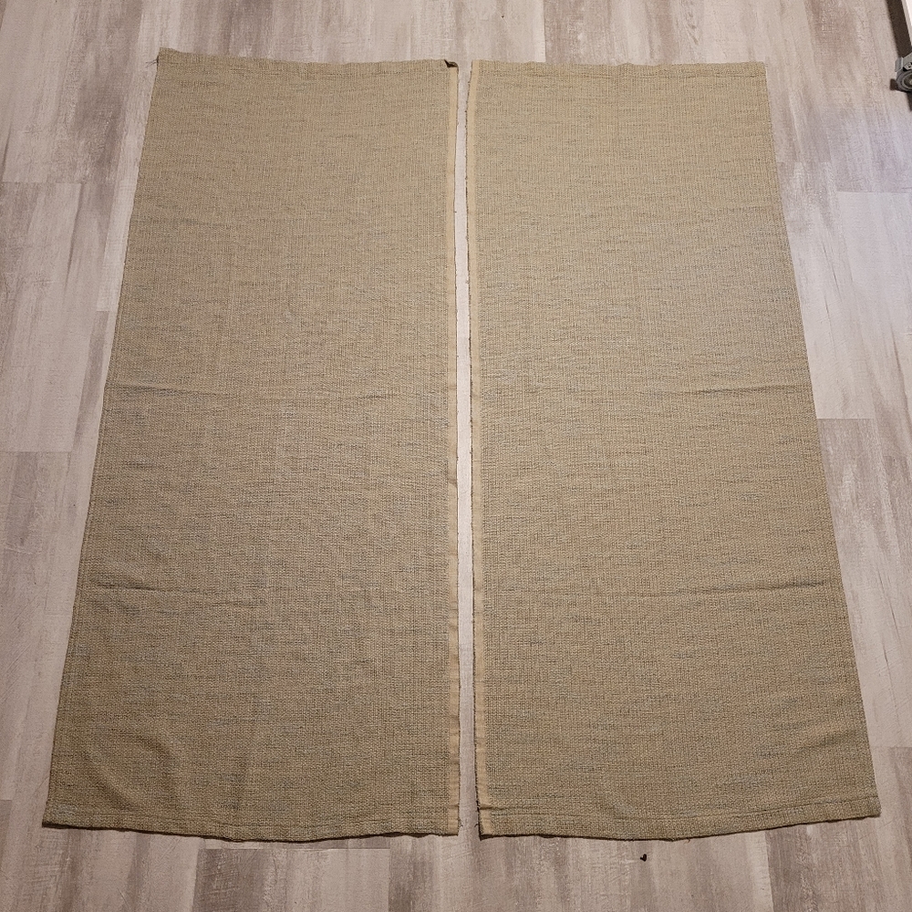Two Tan and Blue Curtains